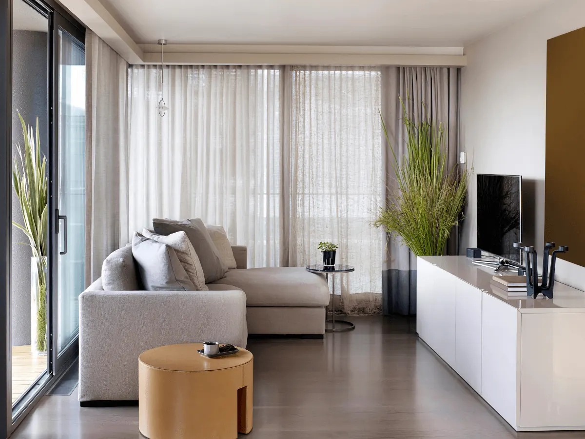 Motorized roller shades on tall Franklin windows